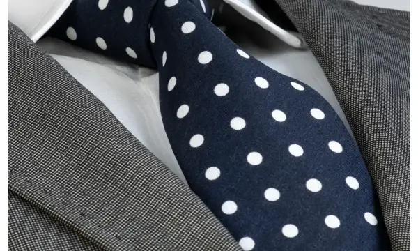 Navy and white polka dot cotton tie